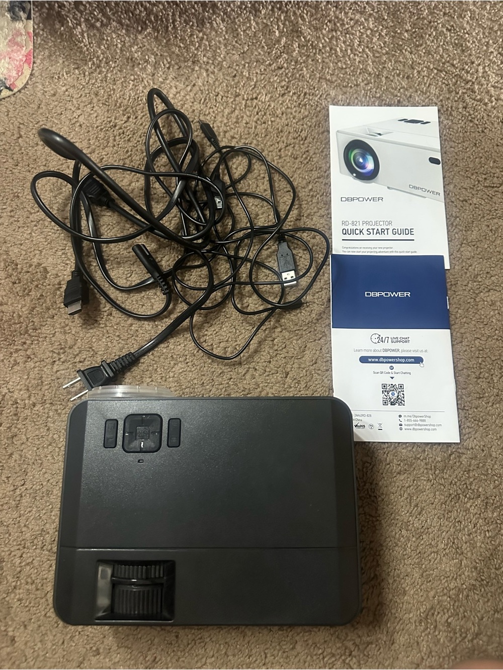 Black Portable Mini Projector with Cables and Quick Start Guide